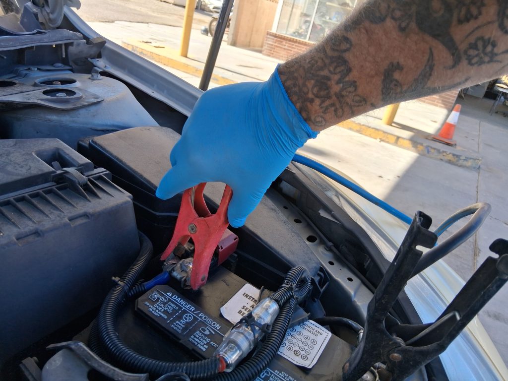 A towing operator gives a driver roadside assistance in Jacumba Hot Springs
